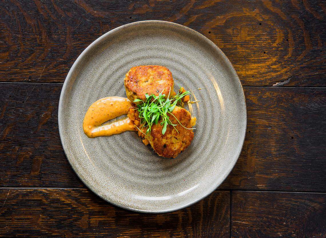 Crab cakes from Gallery Restaurant made with jumbo lump crab and cilantro pesto.