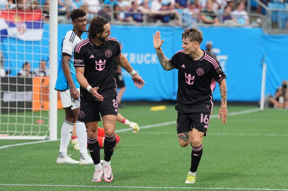Jul 3, 2024; Charlotte, North Carolina, USA; Inter Miami CF midfielder Robert Taylor (16) celebrates forward Leo Campana (8) after scoring a goal against Charlotte FC in the first half at Bank of America Stadium. Mandatory Credit: Jim Dedmon-USA TODAY Sports