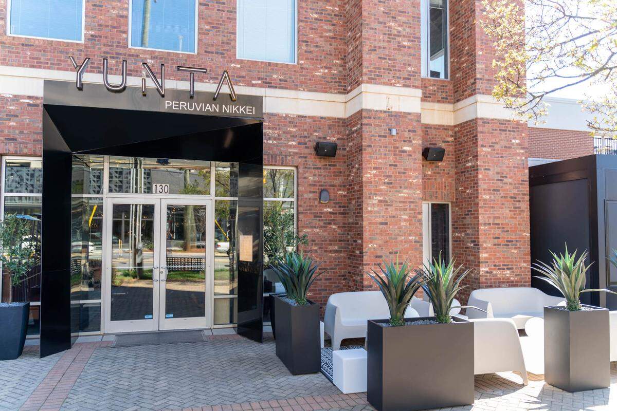 Yunta entrance and patio seating.