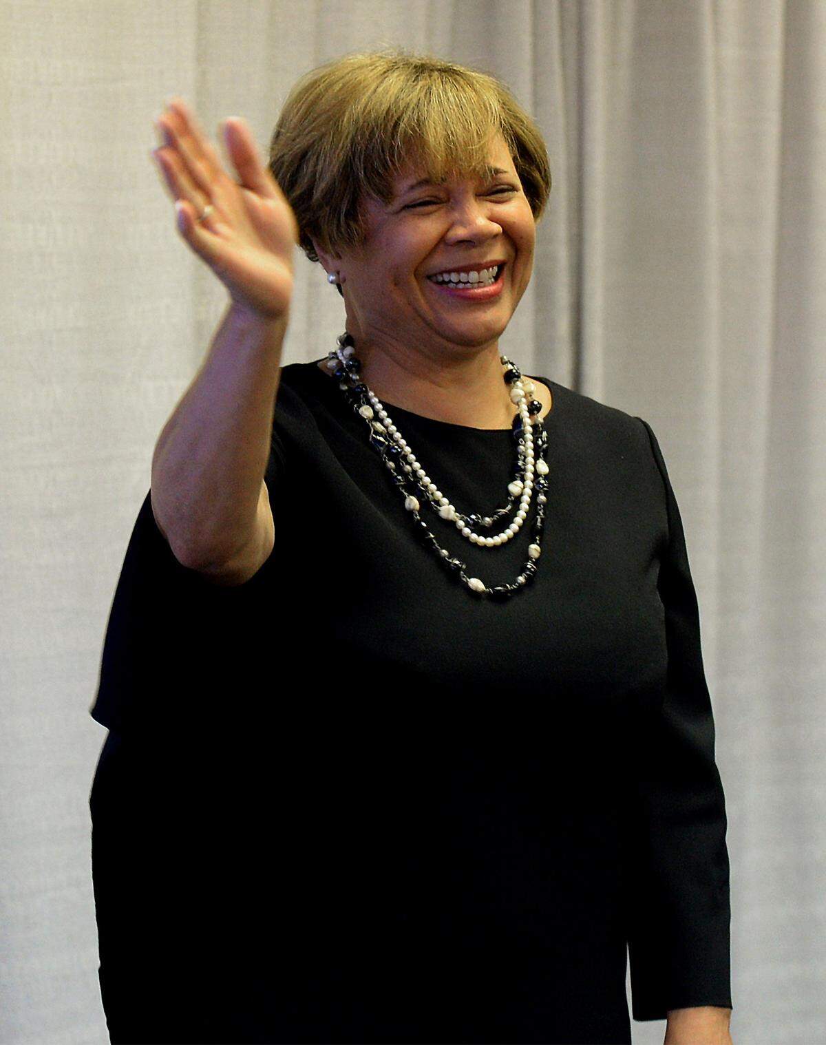 Charlotte Mayor Elect Vi Lyles waves as she is greeted by supporters on Tuesday, November 7, 2017 after defeating Kenny Smith. The victory for Lyles makes her the first African American female to hold the office.