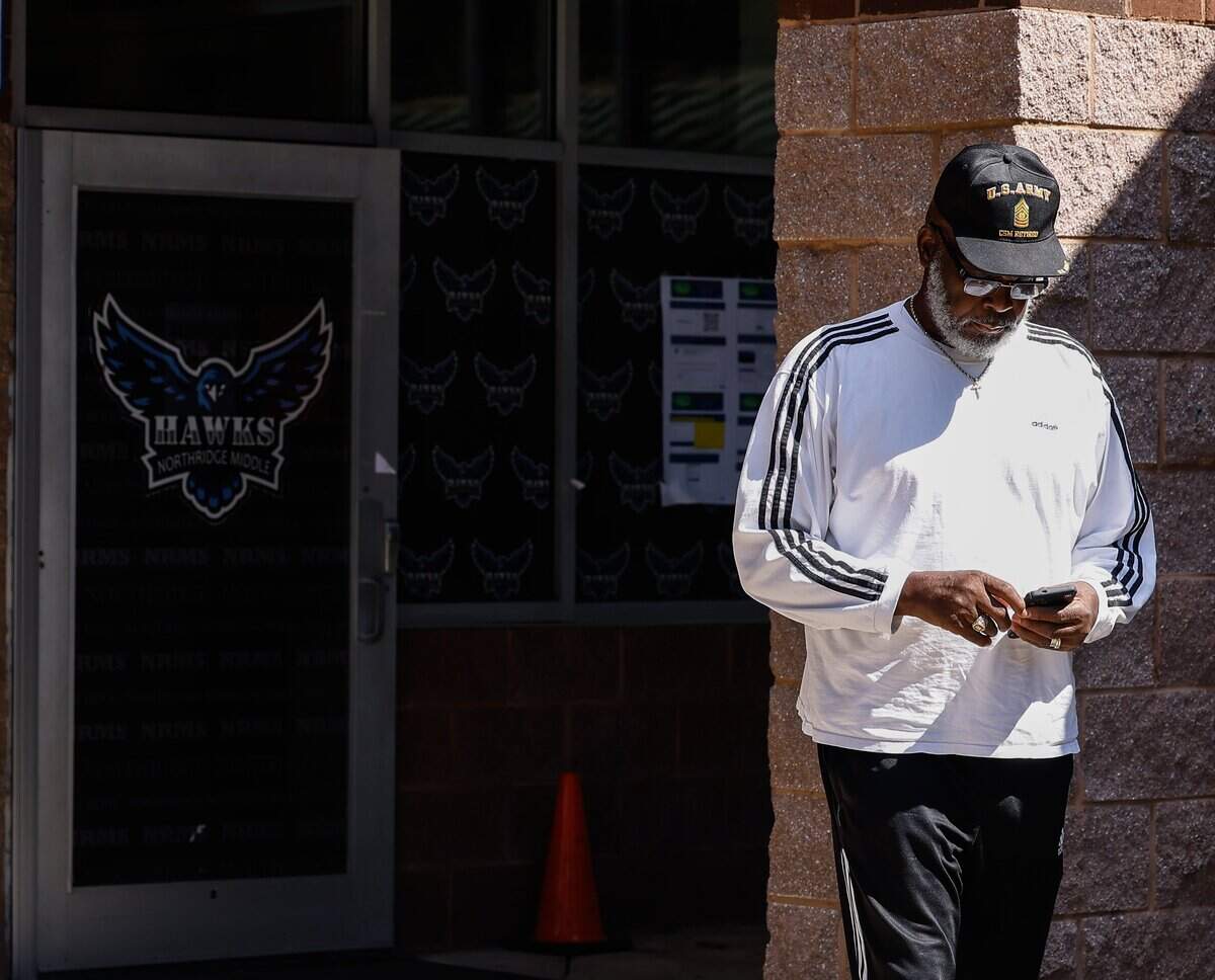 Reginald D. Grier, Sr. leaves North Ridge Middle School in east Charlotte after voting in the primary election on Tuesday, Sept. 9, 2025.