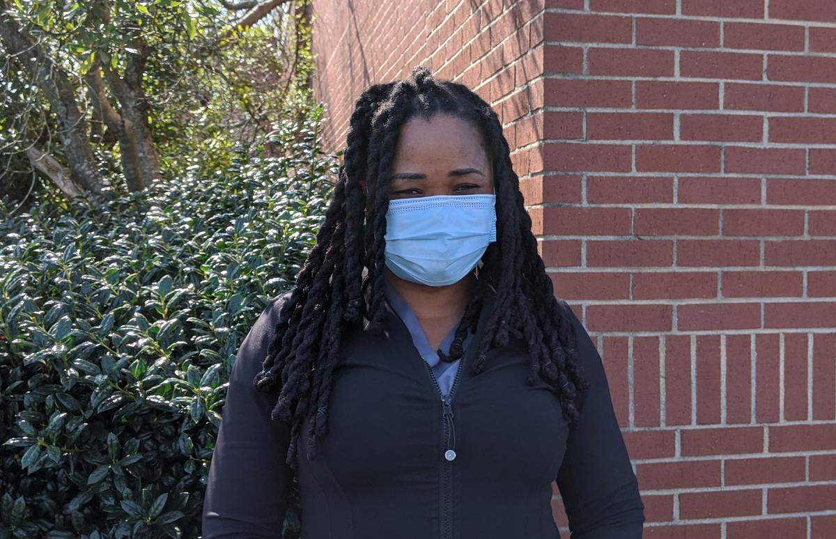 Chichi Nwankwo, who became a citizen in 2018, stood in line for more than three hours to vote at Shoppes at University Place on Thursday. She said she felt it is her duty to vote.