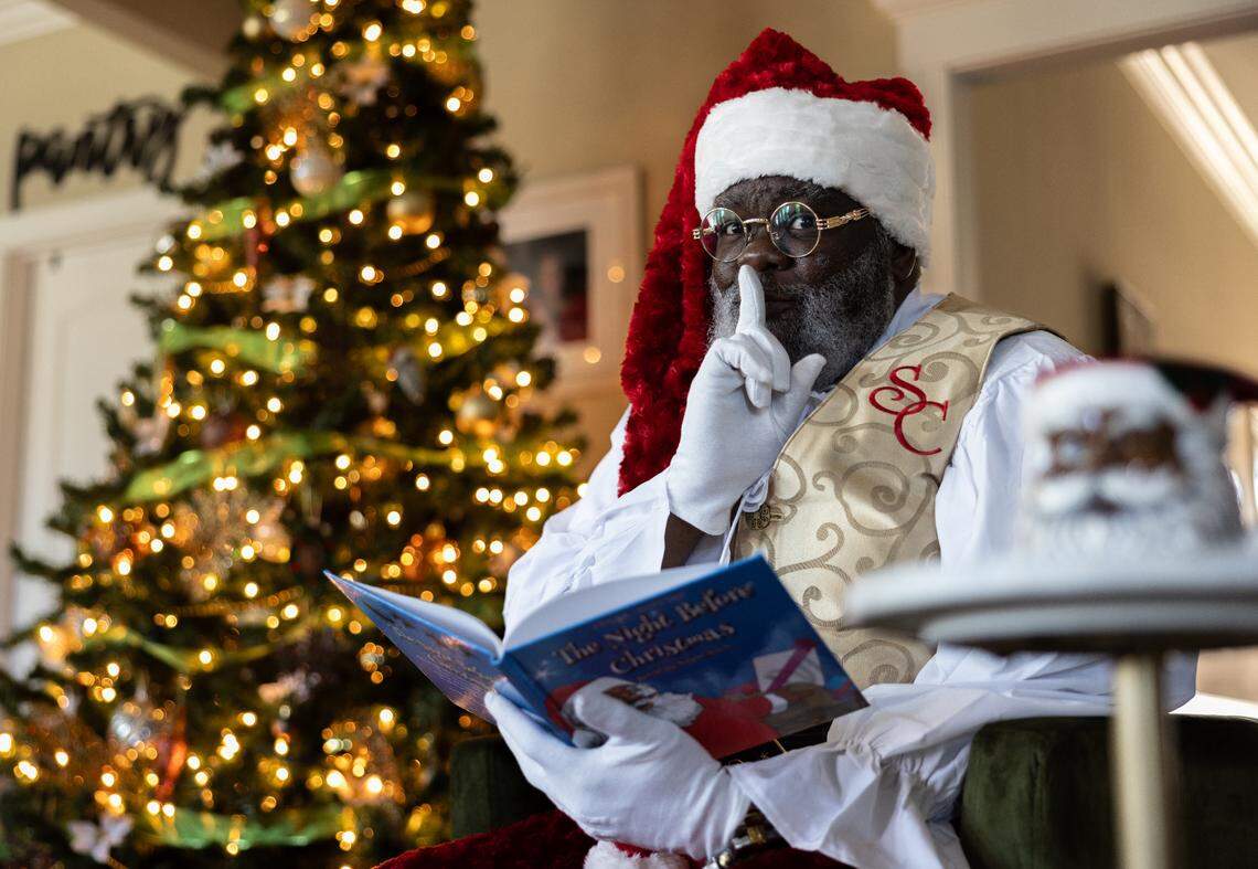 Titus Hopper poses for a portrait dressed in his Santa Claus costume at his home in Kings Mountain, N.C., on Wednesday, November 29, 2023. Hopper graduated from the Northern Lights Santa Academy and has done many community events as well as private parties for celebrities like Nick Cannon.