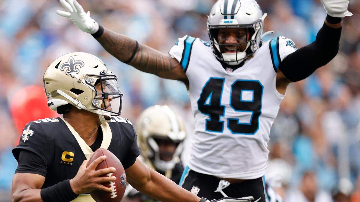 Carolina Panthers linebacker Frankie Luvu (49) pressures New Orleans Saints quarterback Jameis Winston (2) who throes the ball away during a game at Bank of America Stadium in Charlotte, N.C., Sunday, Sept. 25, 2022.