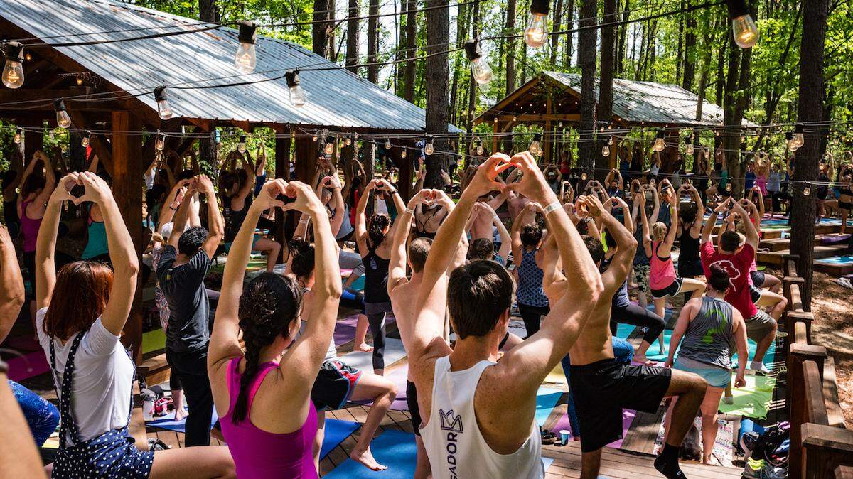 Both beginners and experienced yogis can stretch and relax at the Whitewater Center Flow Fest, which will see yoga take over the U.S. National Whitewater Center.