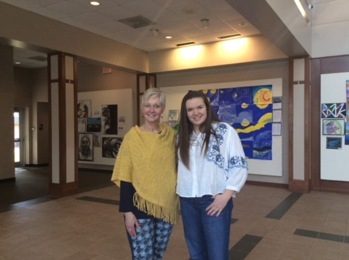 Teacher Holt Harris, ArtPop class of 2020, stands with her student Katherine Heilig, ArtPop class of 2021, wearing jeans created by Heilig.