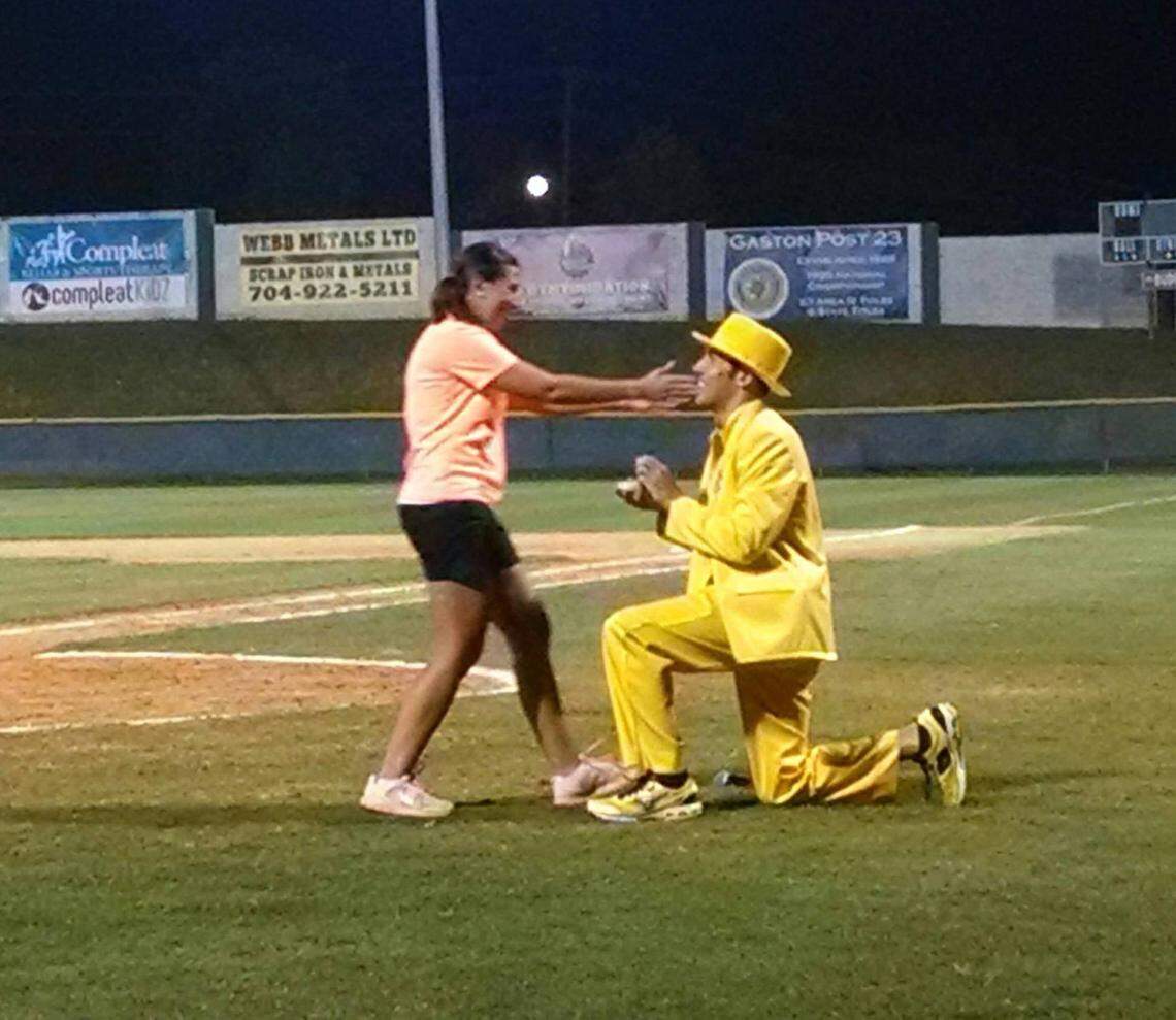 Jesse Cole proposed to his wife Emily on a baseball field in Gastonia during a Gastonia Grizzlies game. Although the Savannah Bananas didn’t actually exist yet, he already had his yellow tuxedo.