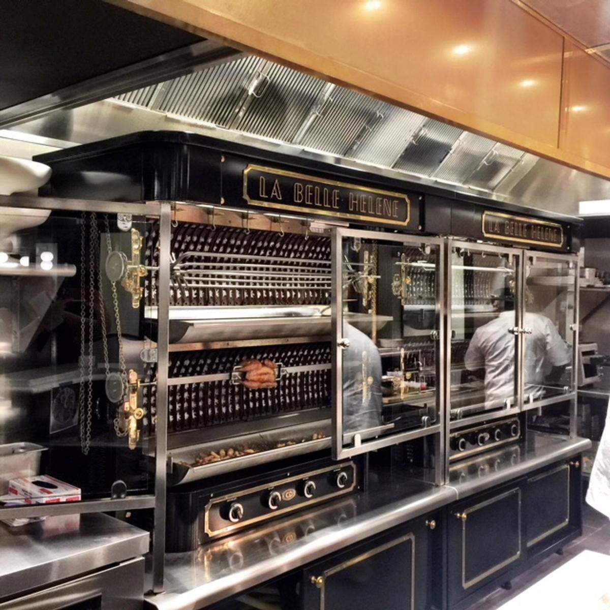 The action in La Belle Helene will be around the Paris-built rotisserie, which can hold more than 50 chickens and will also often feature something special, like a suckling pig.