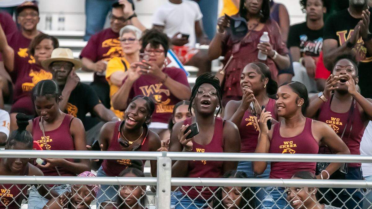 West Charlotte fans celebrate their comeback at an Aug. 25, 2023 game. On Sept. 22, 2023, large fights broke out at Friday night football games at West Charlotte and Harding University high schools.