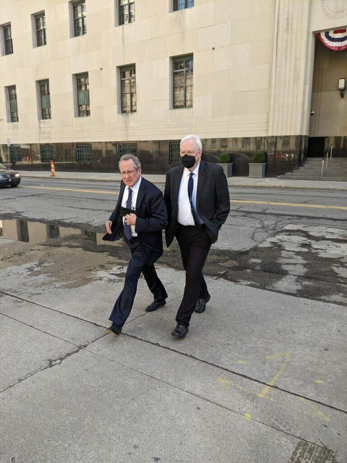 Stephen Shipps and his attorney, John Shea, leave the federal courthouse in Detroit after Shipps was sentenced to five years in prison for trafficking an underage student for sex.