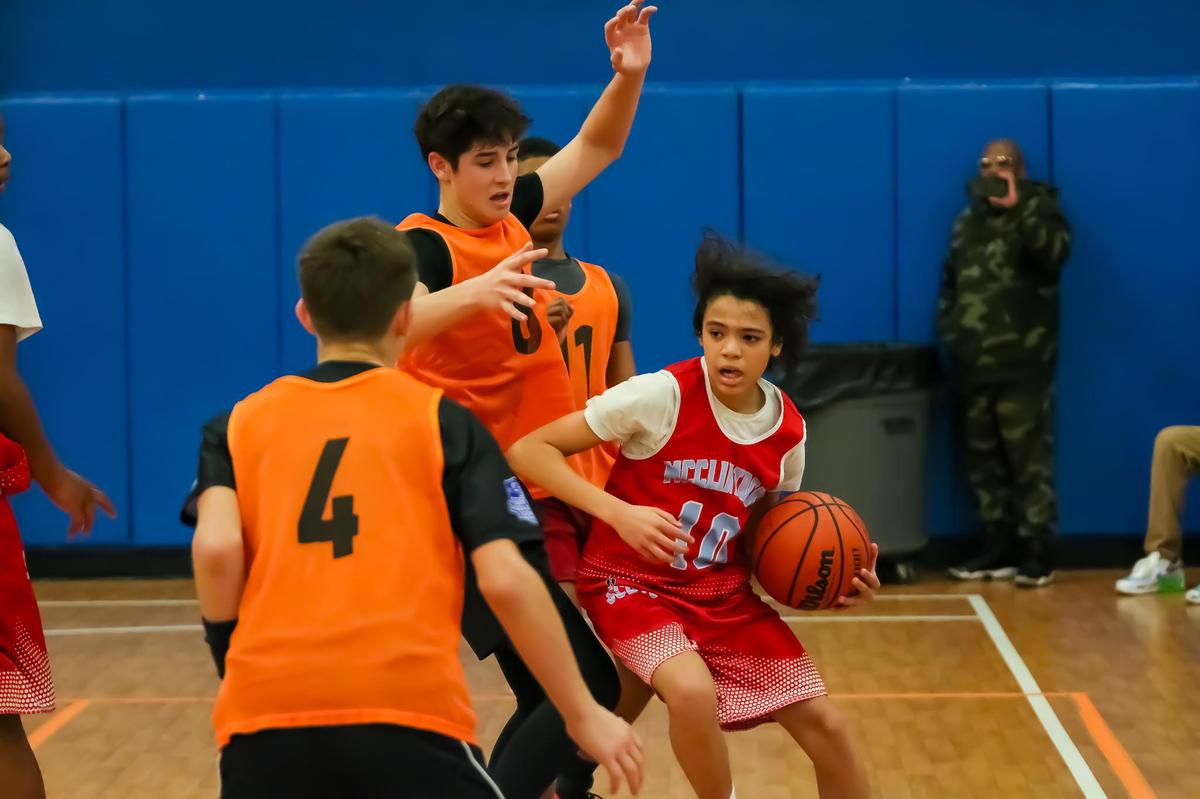 Middle school kids of all ages came out to participate in the 3rd Annual Muggsy Bogues’ middle school basketball tournament at Carolina Courts in Indian Trail, NC