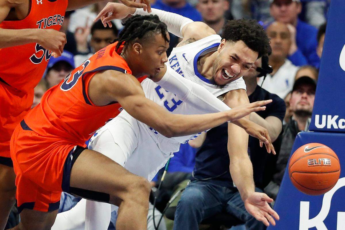 Auburn’s Isaac Okoro (left) battles against Kentucky in a 2020 game. Jay Bilas says he considers Okoro the top defender in the upcoming NBA draft.