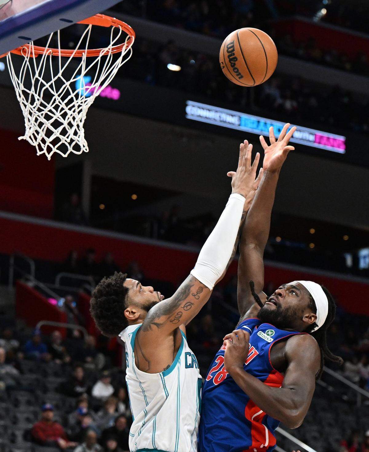 Detroit Pistons center Isaiah Stewart (28) shoots the ball over Charlotte Hornets forward Miles Bridges (0) in the first quarter at Little Caesars Arena.
