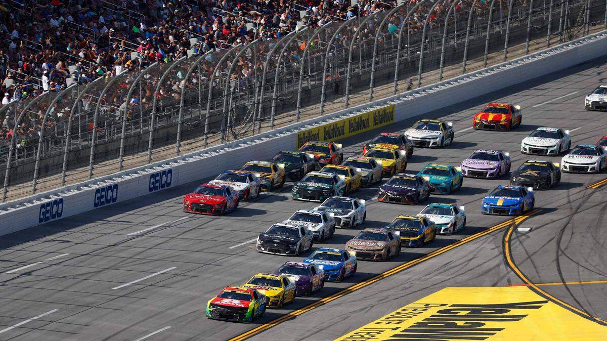 NASCAR Cup Series driver William Byron (24) leads the pack down the front stretch during the YellaWood 500 at Talladega Superspeedway. 
