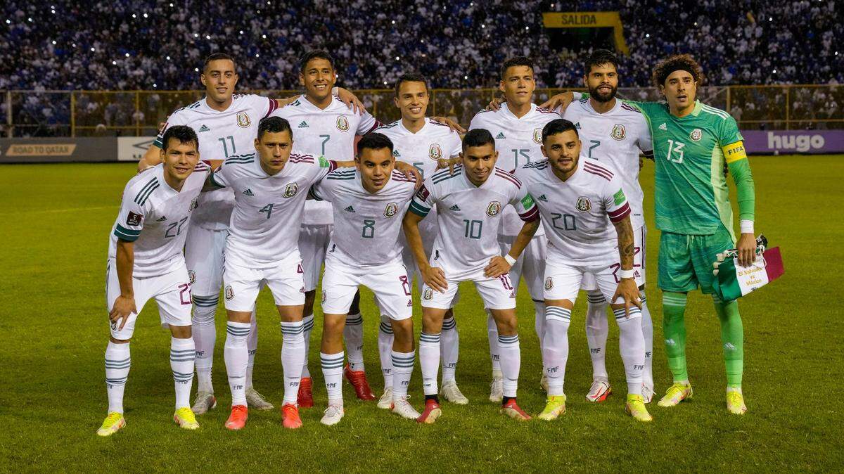 Mexico’s starting players pose for a team photo at the beginning of a World Cup qualifying soccer match at El Salvador on Oct. 13. Mexico plays Ecuador in a friendly in Charlotte on Wednesday.