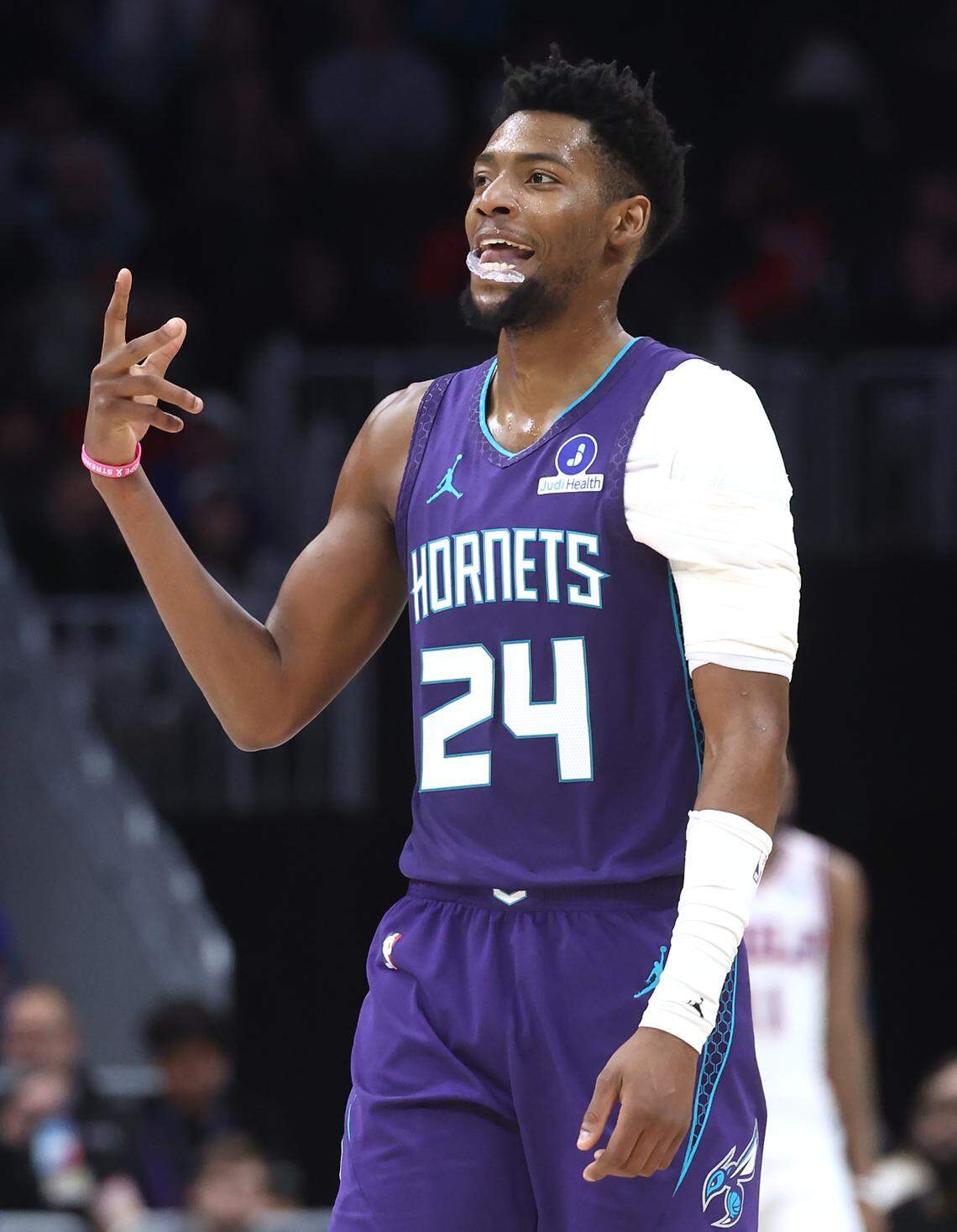 Charlotte Hornets guard Brandon Miller celebrates a three-point play during action against the Philadelphia 76ers at Spectrum Center in Charlotte, NC on Monday, January 26, 2026. The Hornets defeated the 76ers 130-93.
