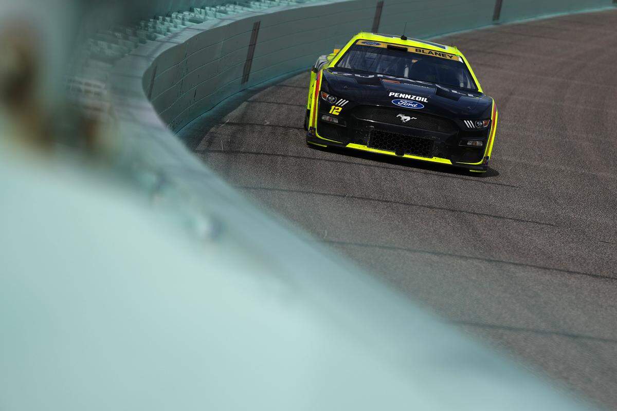 Oct 22, 2023; Homestead, Florida, USA; NASCAR Cup Series driver Ryan Blaney (12) races during the 4EVER 400 presented by Mobil 1 at Homestead-Miami Speedway. Mandatory Credit: Jasen Vinlove-USA TODAY Sports