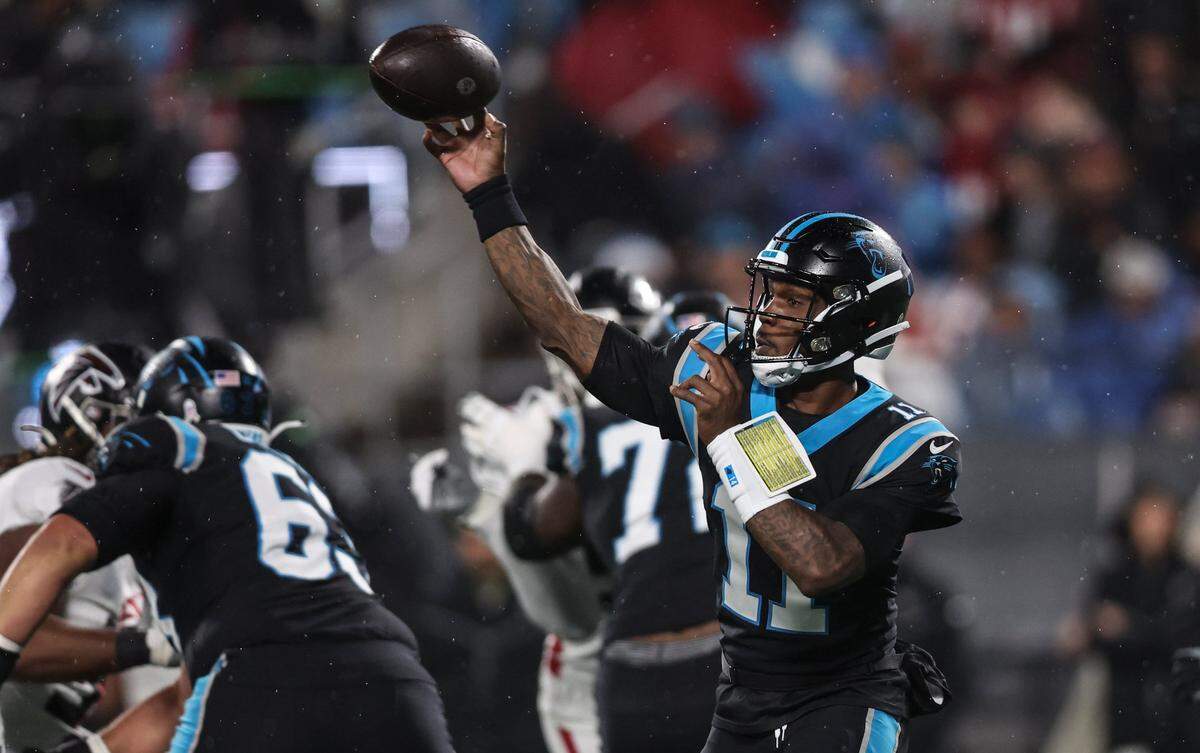 Carolina Panthers quarterback PJ Walker makes a pass against the Atlanta Falcons on Thursday, November 10, 2022.