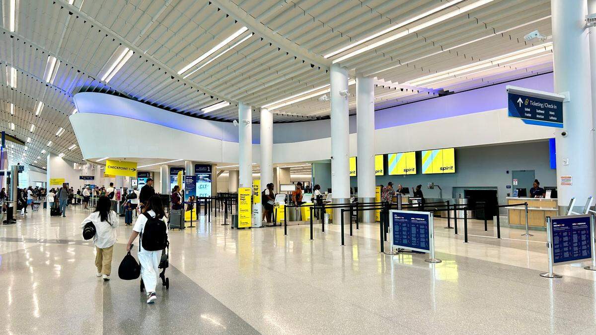 Debby hits NC, grounding more Charlotte airport flights and extending passenger misery
