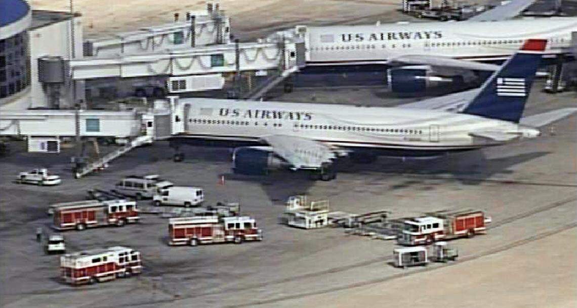 Emergency vehicles at Charlotte Douglas International Airport, on the scene of a March 2010 fume event. This was the same US Airways plane that had sent Denise Weiss, Sylvia Baird, and five other crew members to the hospital two months earlier.