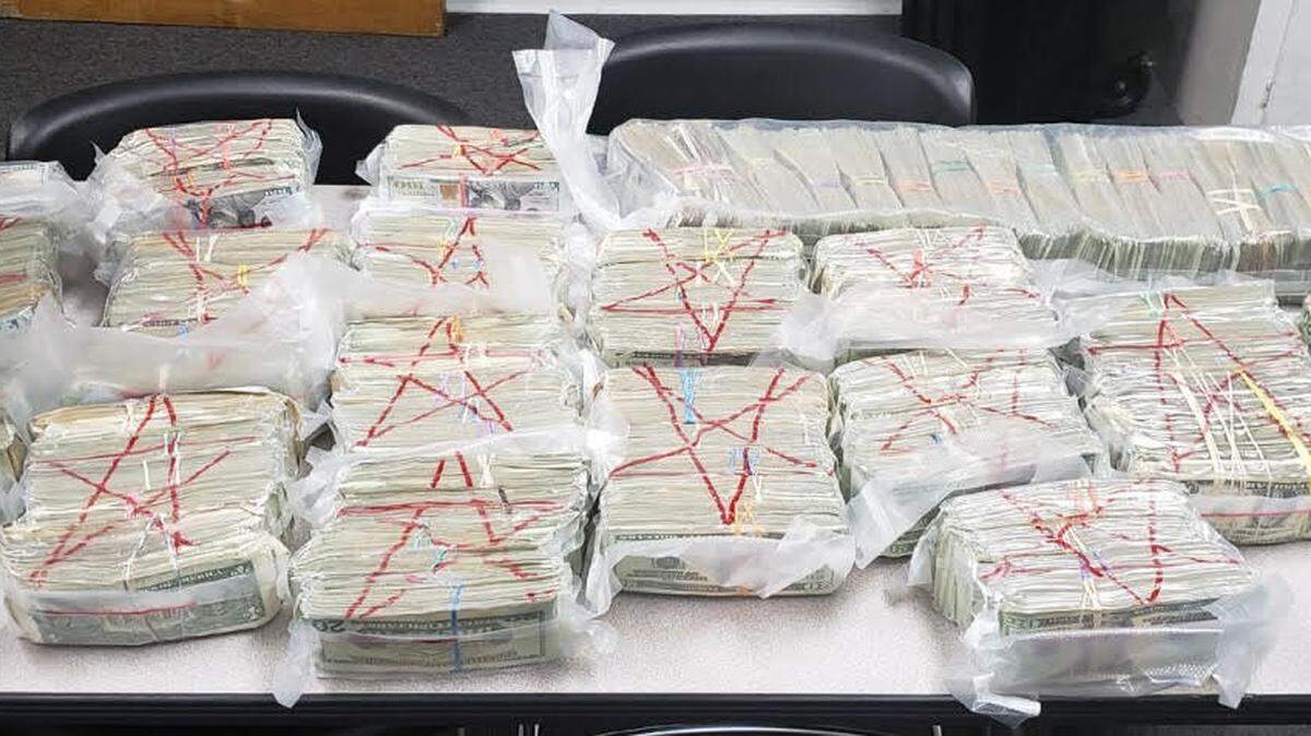 Almost $1 million in cash was seized from Seneca Moore’s pickup in May 2020. Prosecutors suspect the cash is drug money. The red star is a symbol linked to the gang, Nine Trey Gangsters.