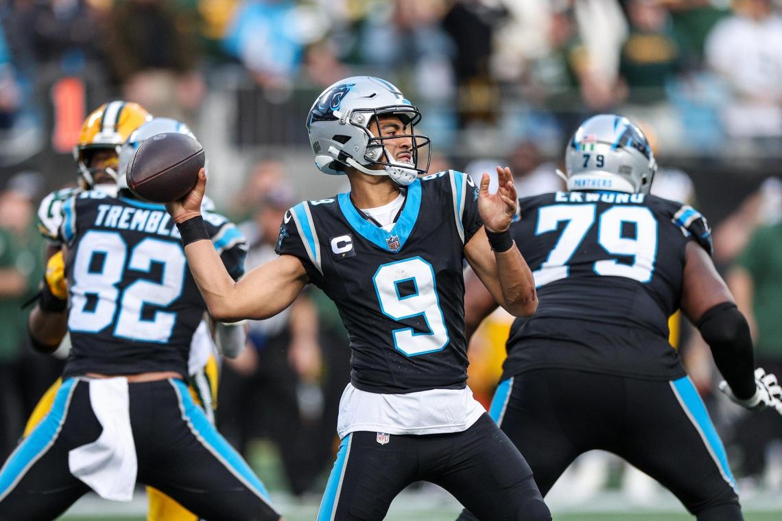 Carolina Panthers quarterback Bryce Young (9) lauches a pass to wide receiver DJ Chark, Jr. as the team drives down the field during the game against the Packers at Bank of America Stadium on Sunday, December 24, 2023.