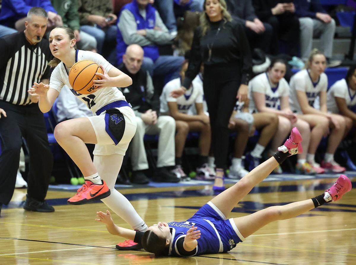 Lake Norman’s Samantha Shehan, left, steals the ball from Mooresville’s Riley Parker, right, during action on Wednesday, January 22, 2025 at Lake Norman High School.
