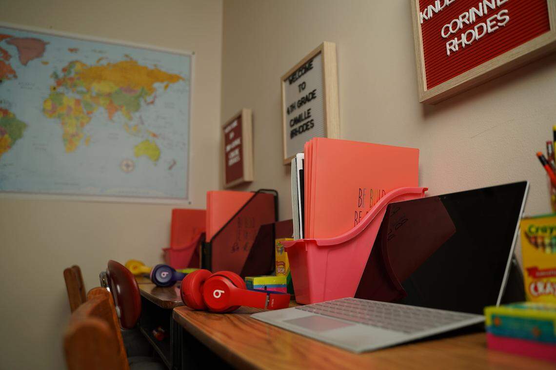 The Rhodes family set up a home classroom space to help their children dive in to virtual learning.