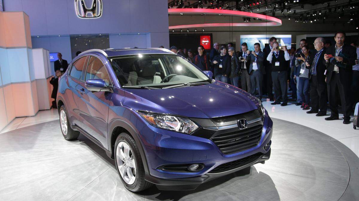 FILE - In this Nov. 19, 2014 file photo, the 2016 Honda HR-V crossover is unveiled at the Los Angeles Auto Show, in Los Angeles. U.S. auto sales were stronger than expected in May, boosted by Memorial Day promotions and strong demand for new SUVs. Honda sold more than 6,300 HR-Vs in the first two weeks it was on sale. (AP Photo/Jae C. Hong, File)