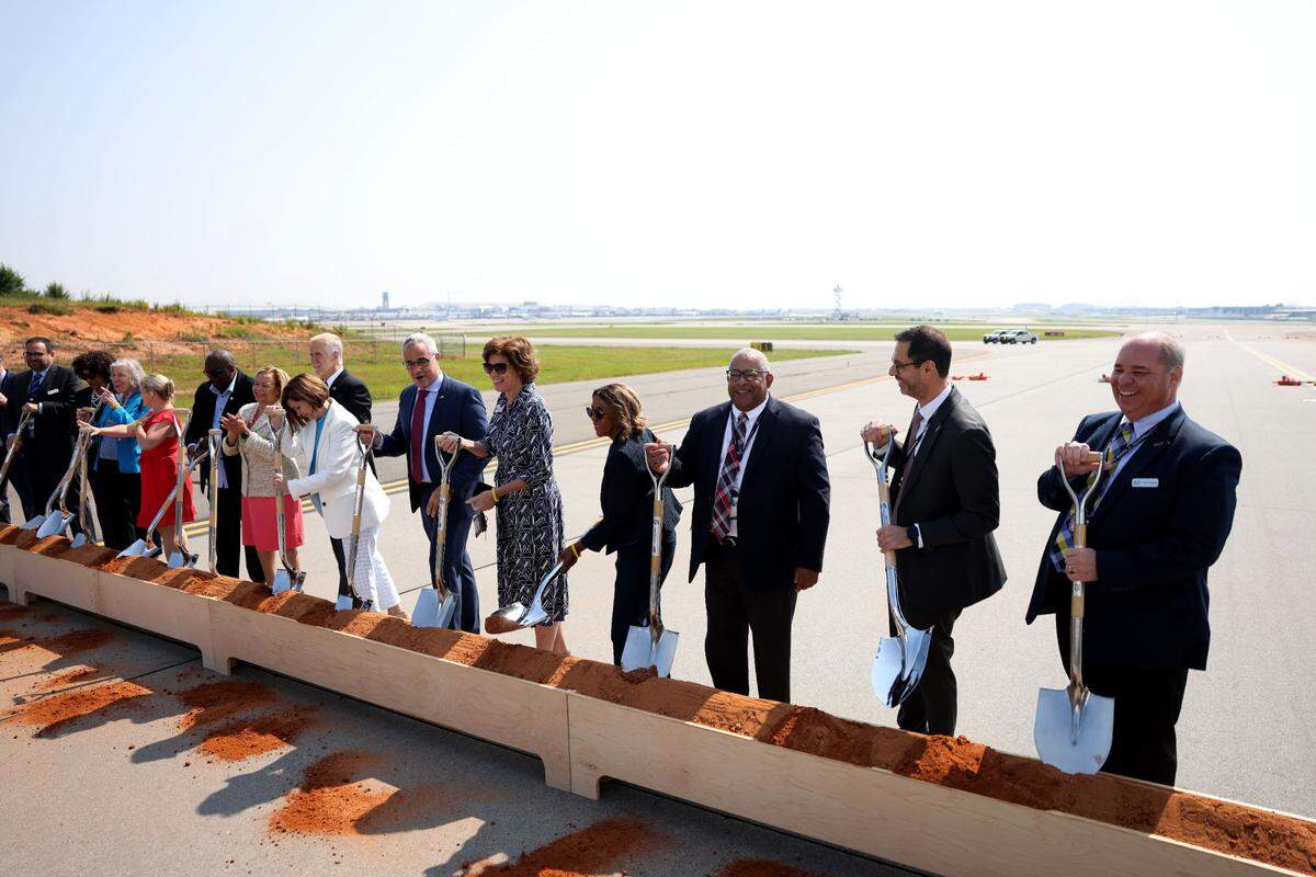 U.S. Sen. Thom Tillis, Mayor Vi Lyles&nbsp;and other officials  participated in groundbreaking for a fourth parallel runway at Charlotte Douglas International Airport Friday.