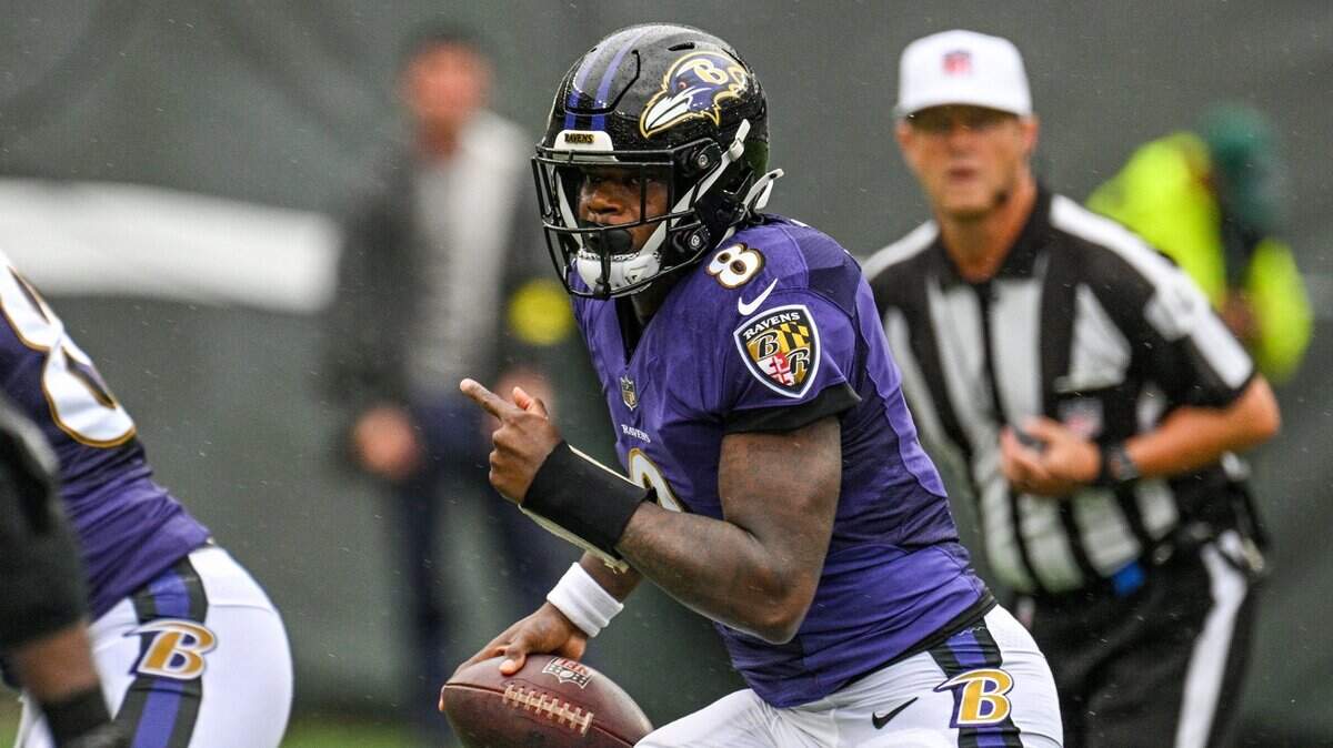 Baltimore Ravens quarterback Lamar Jackson looks for room to run during a game against the New York Jets on Sept. 11, 2022, in East Rutherford, New Jersey. (Jerry Jackson/The Baltimore Sun/TNS)