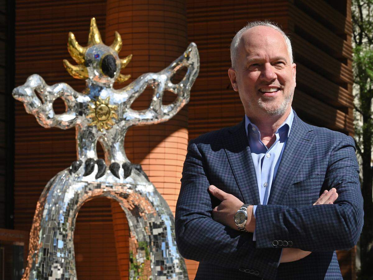 Bechtler Museum of Modern Art Executive Director Todd Smith stands near the Firebird sculpture outside the museum. The museum is marking the 15th anniversary of one of the most popular sites in Charlotte.