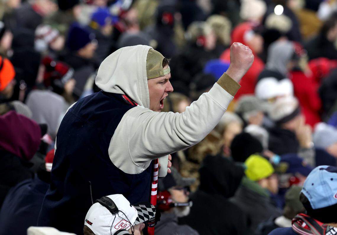 A NASCAR Cup Series fan cheers on his driver during the Cook Out Clash race at Bowman Gray Stadium in Winston-Salem, NC on Sunday, February 2, 2025.