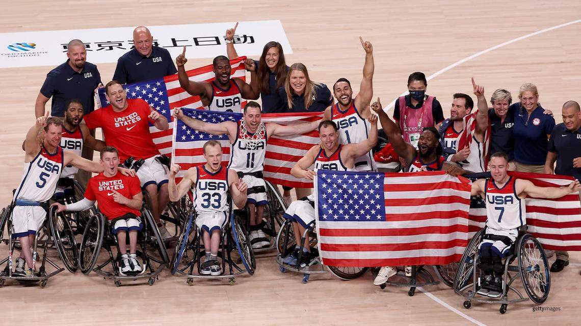 Team USA celebrates a victory at the 2020 Tokyo Paralympic Games. Charlotte’s Ryan Neiswender (7) is among those celebrating. He is an alternate for the team training to play in the 2024 Paralympic Games in Paris.