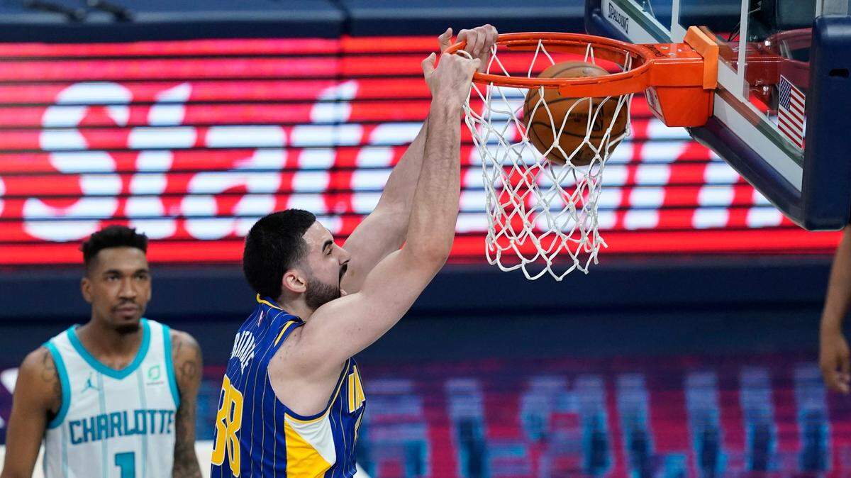 Indiana’s Goga Bitadze dunks during the second half of the team’s NBA basketball Eastern Conference play-in game against Charlotte Tuesday. The Pacers won in a rout, 144-117.