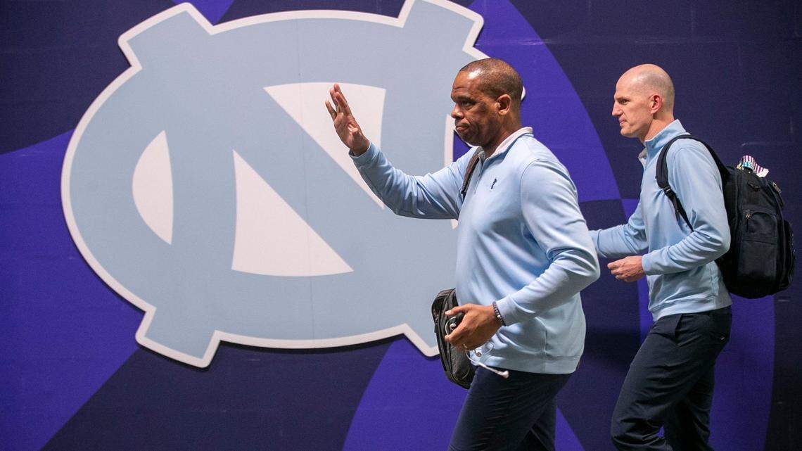 North Carolina coach Hubert Davis and assistant coach Brad Frederick arrive for their NCAA National Championship game against Kansas on Monday, April 4, 2022 at Caesars Superdome in New Orleans, La.