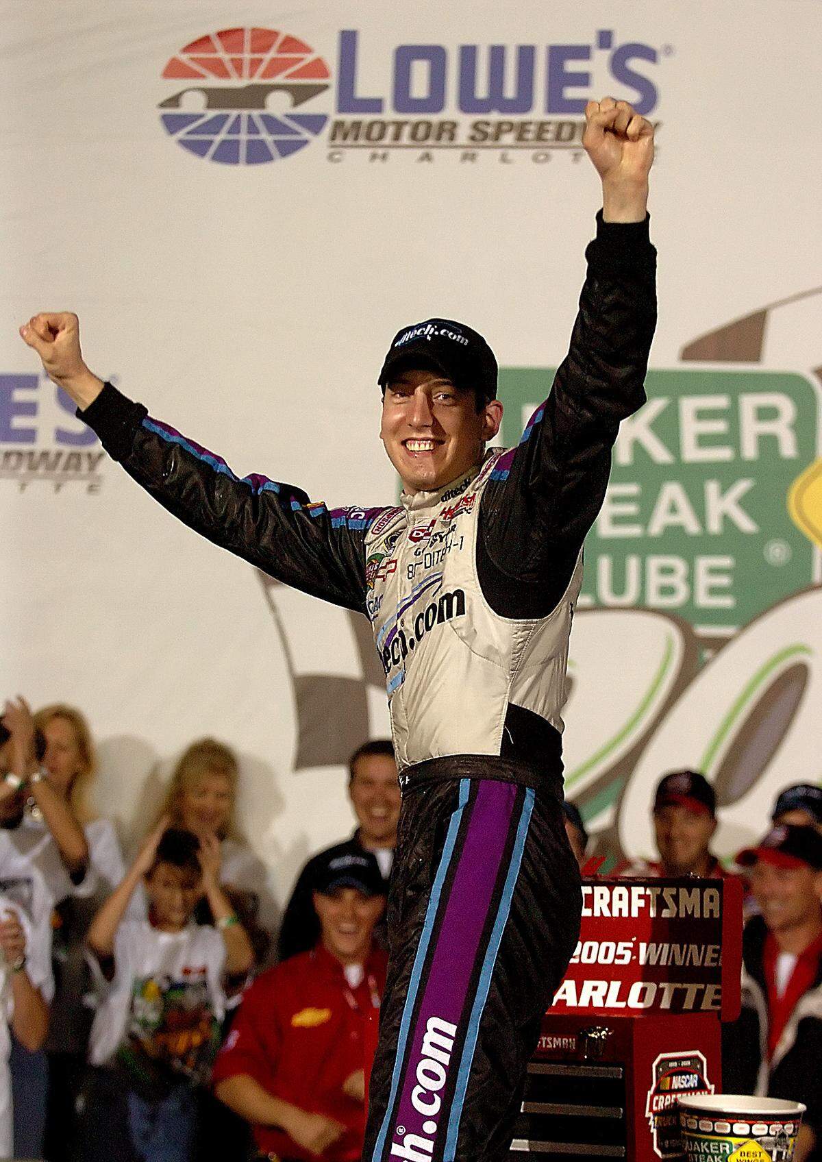 5/20/05 Kyle Busch celebrates his victory in the Quaker Steak & Lube 200 Friday evening at Lowe's Motor Speedway.   JEFF SINER/STAFF