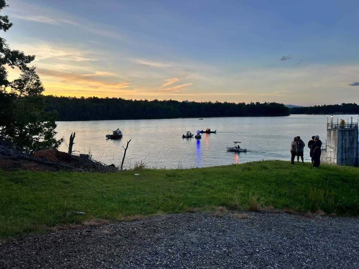 Emergency crews search for a missing swimmer on Lake James Saturday night, June 13.