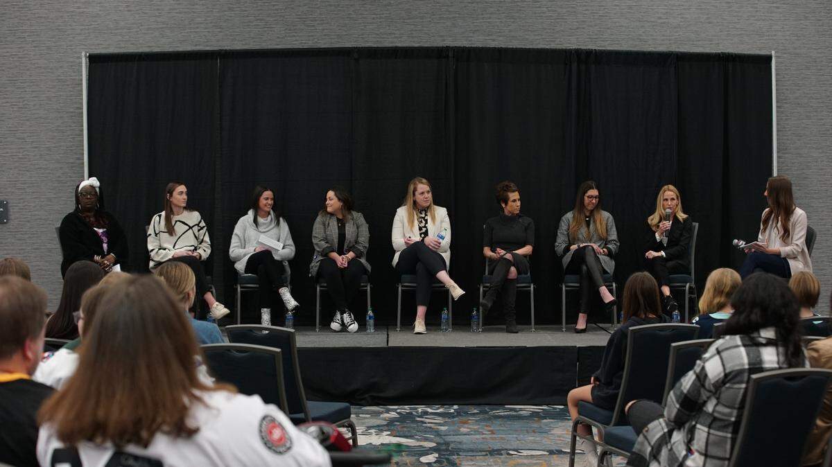 The full International Women’s Day panel put on by the Charlotte Checkers on Wednesday, March 8, 2023. From left to right: Shawn Coston, Annie Eagle, Sydney Shaw, Paige Sliney, Elizabeth Mantha, Mary Grams, Hayley Moore, Tera Black, Ashley Stroehlein.