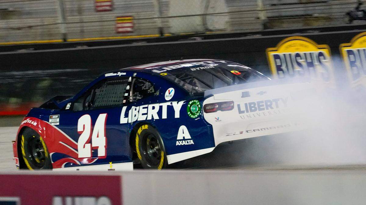 William Byron’s car leaves a trail of smoke after an accident during the NASCAR Cup Series auto race Saturday, Sept. 19, 2020, in Bristol, Tenn. (AP Photo/Steve Helber)