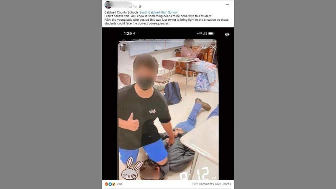 A photo widely shared on social media appears to show two students at South Caldwell High School in Western North Carolina mocking George Floyd’s death. McClatchy News has blurred the faces and other identifying features in this screen grab from Facebook to protect the identity of the students, who are minors.