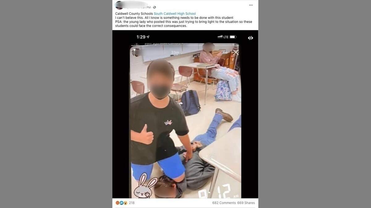 A photo widely shared on social media appears to show two students at South Caldwell High School in Western North Carolina mocking George Floyd’s death. McClatchy News has blurred the faces and other identifying features in this screen grab from Facebook to protect the identity of the students, who are minors.