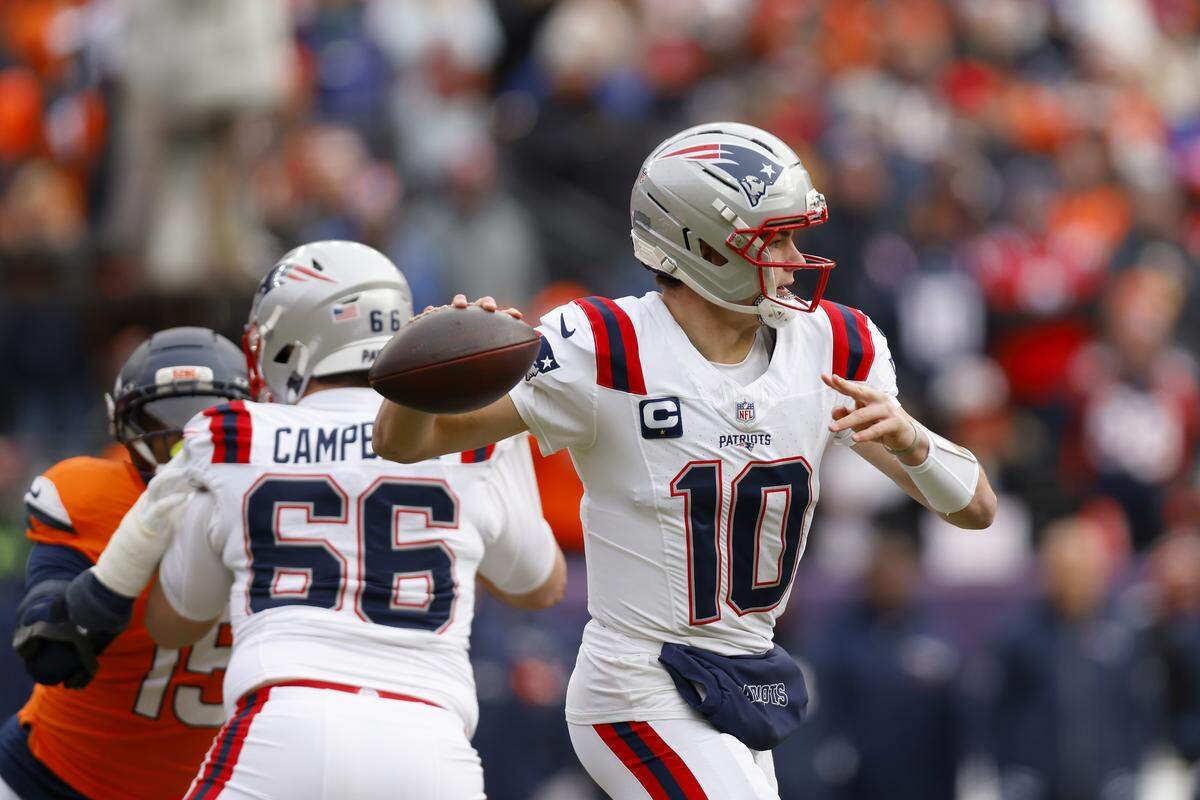 New England Patriots quarterback Drake Maye looks to pass during the first quarter in the AFC Championship Playoff game against the Denver Broncos Sunday.