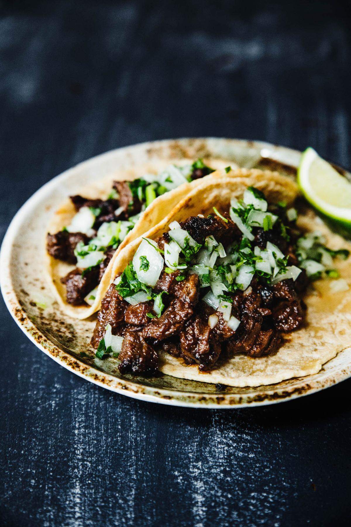 Puerta’s taco fillings will include barbacoa, al pastor, lengua, seafood, carne asada, and a vegetarian option with crispy potatoes in a chipotle mole sauce.