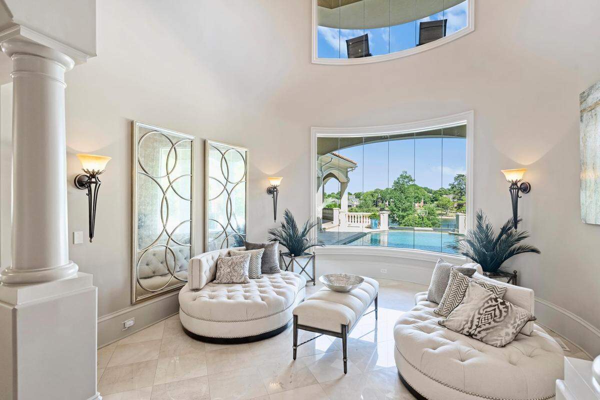 The mansion includes “expansive lakefront living spaces throughout,” Michelle Rhyne, global real estate adviser with Premier Sotheby’s Lake Norman office said in a statement.