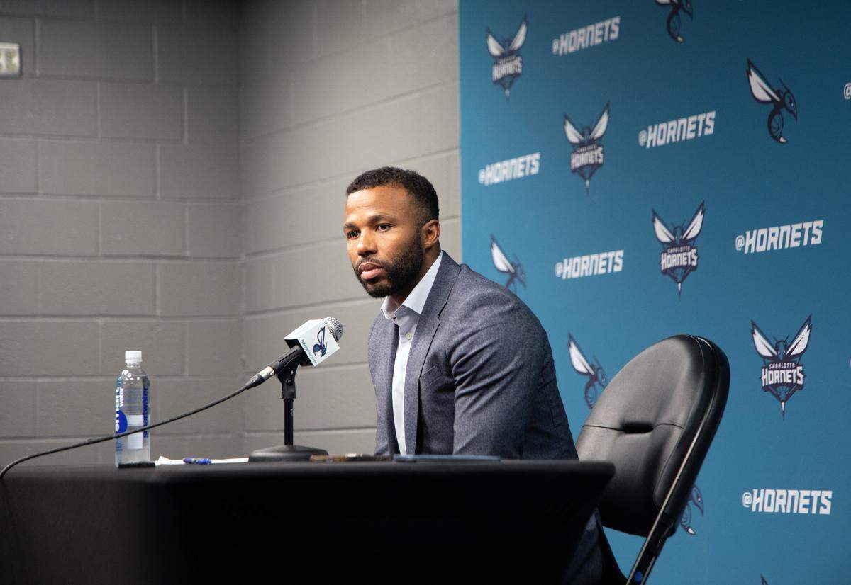 Jeff Peterson, president of basketball operations for the Charlotte Hornets, addresses the press ahead of the player exit interviews at the Spectrum Center on Monday, April 14, 2025.