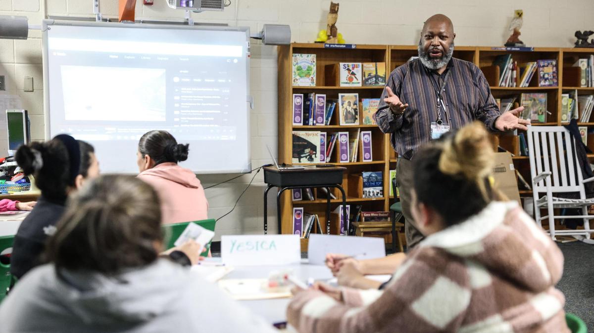Michael Hayes teaches an English as a second language class at Hidden Valley Elementary in Charlotte, N.C., on Thursday, February 2, 2023. The Trump administration has frozen federal funding for migrant students and English learners pending a review.