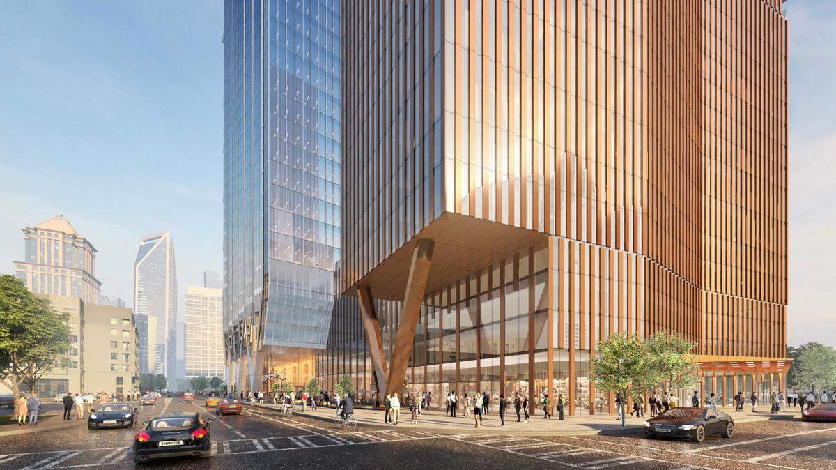 A Chicago developer released fresh renderings for a $750 million project to bring three buildings with a mix of commercial and residential uses to a prominent intersection leading from uptown to South End.