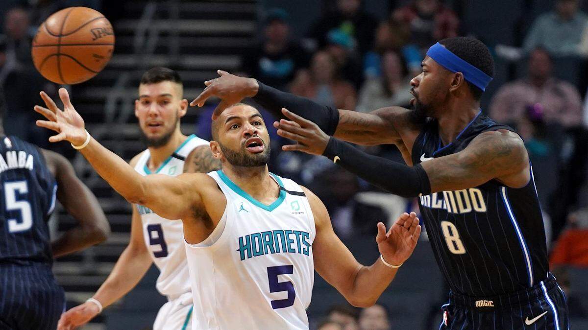 Hornets forward Nicolas Batum, left, is the only Frenchman on Charlotte’s team. The Hornets will play the Bucks on Friday in Paris.