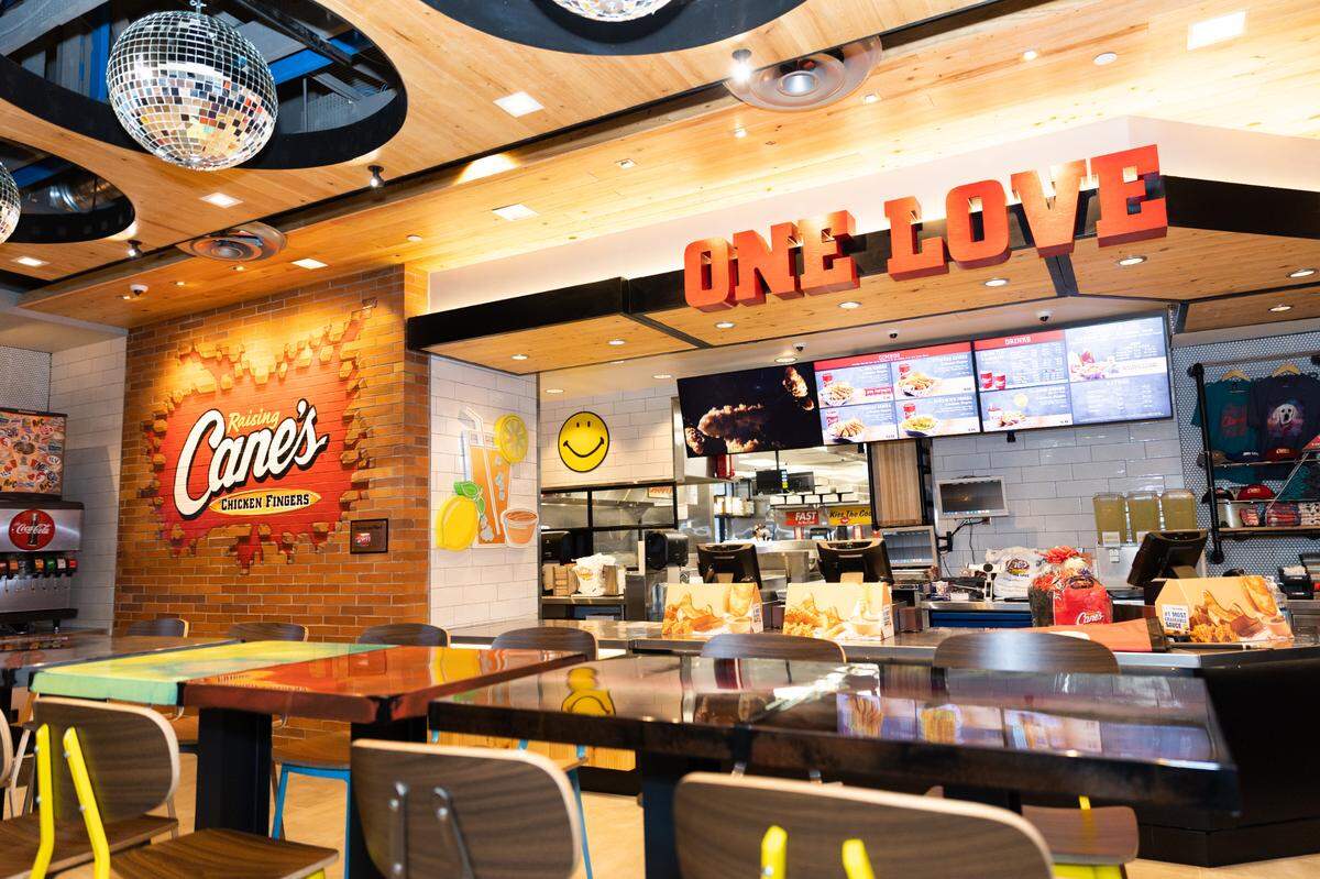 The interior of a Raising Cane’s restaurant.